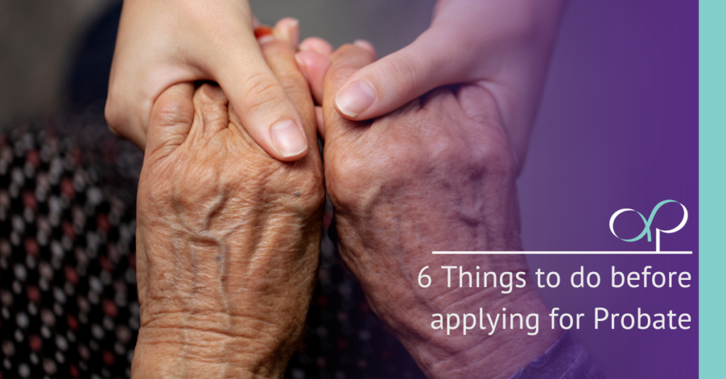 Image of two people holding hands