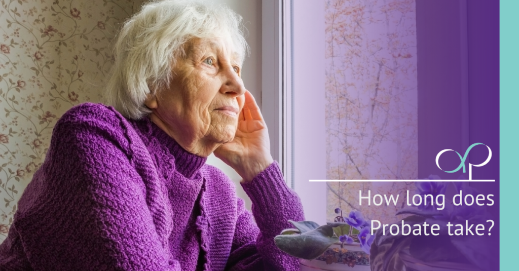 Elderly woman looking out of a window